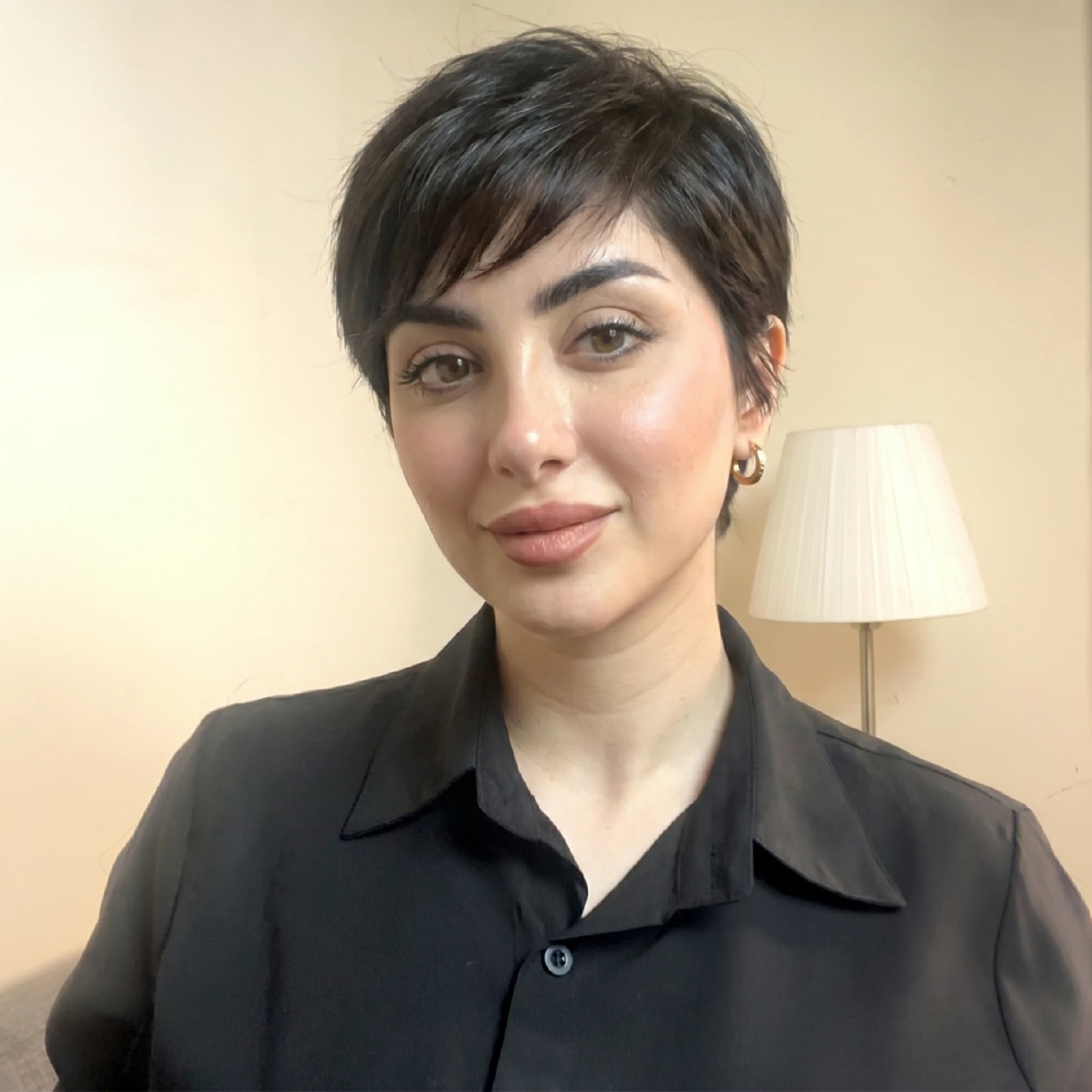 AI try-on result with a pixie cut